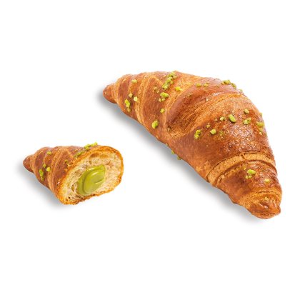 Croissant dourado coberto com pistácio triturado, com recheio cremoso verde de pistácio à vista